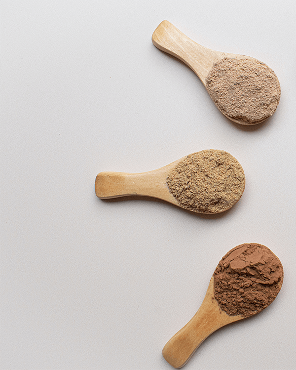 3 spoons containing different powders